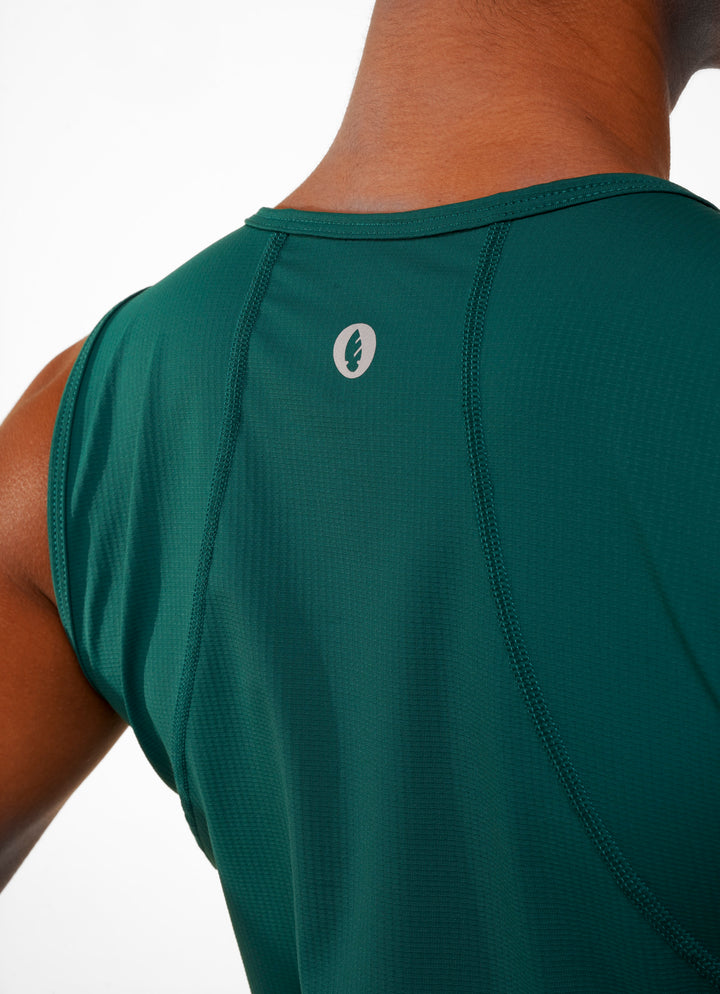 Green athletic tank top with a brand logo on a white background